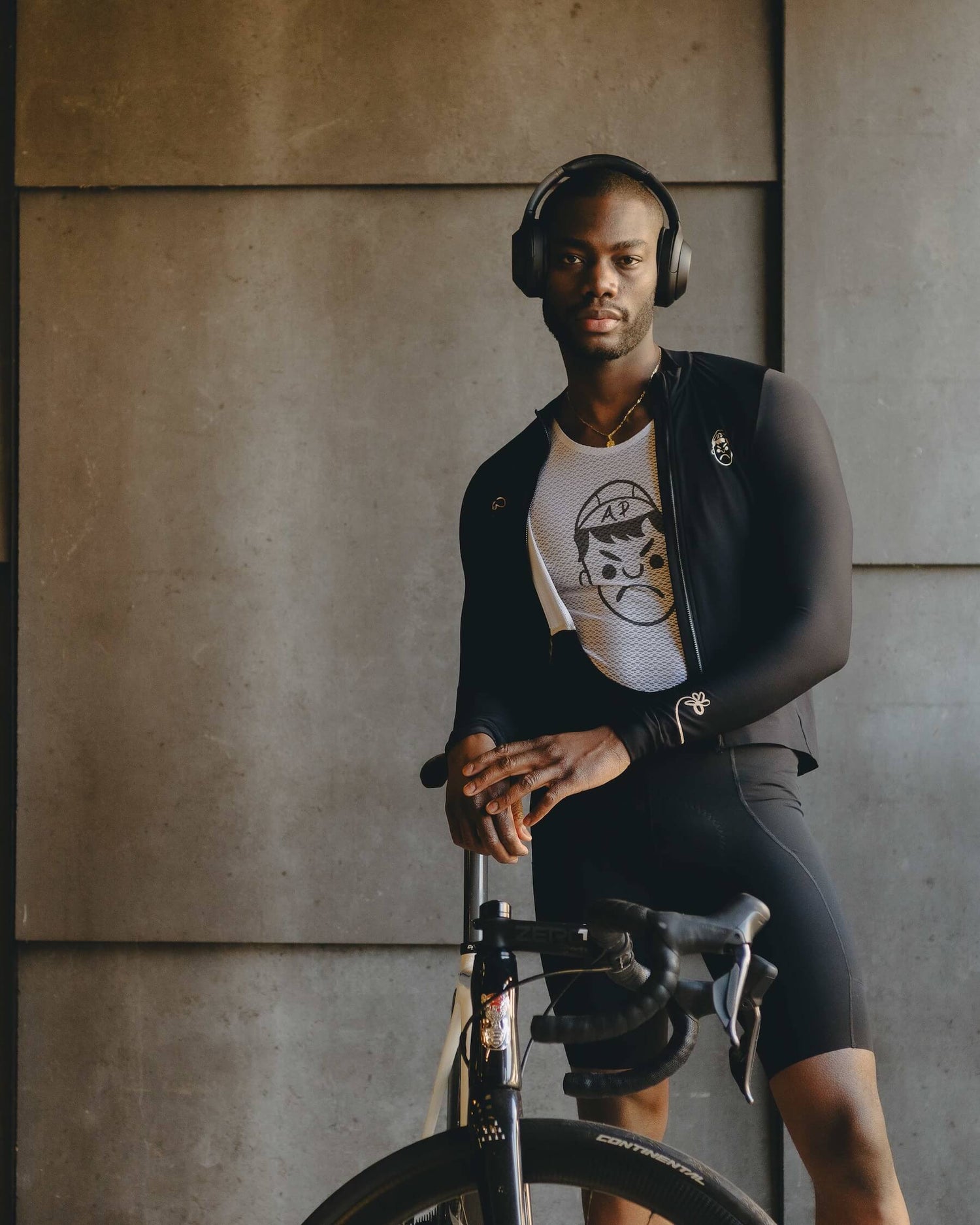 A male cyclist wearing angry pablo cycling clothing