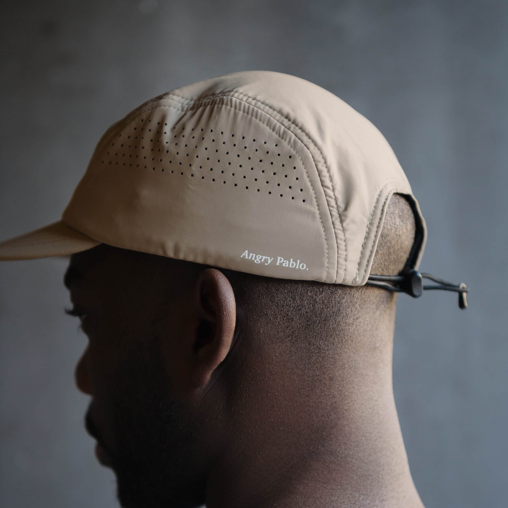 The side profile of the Angry Pablo Lightweight Running Hat